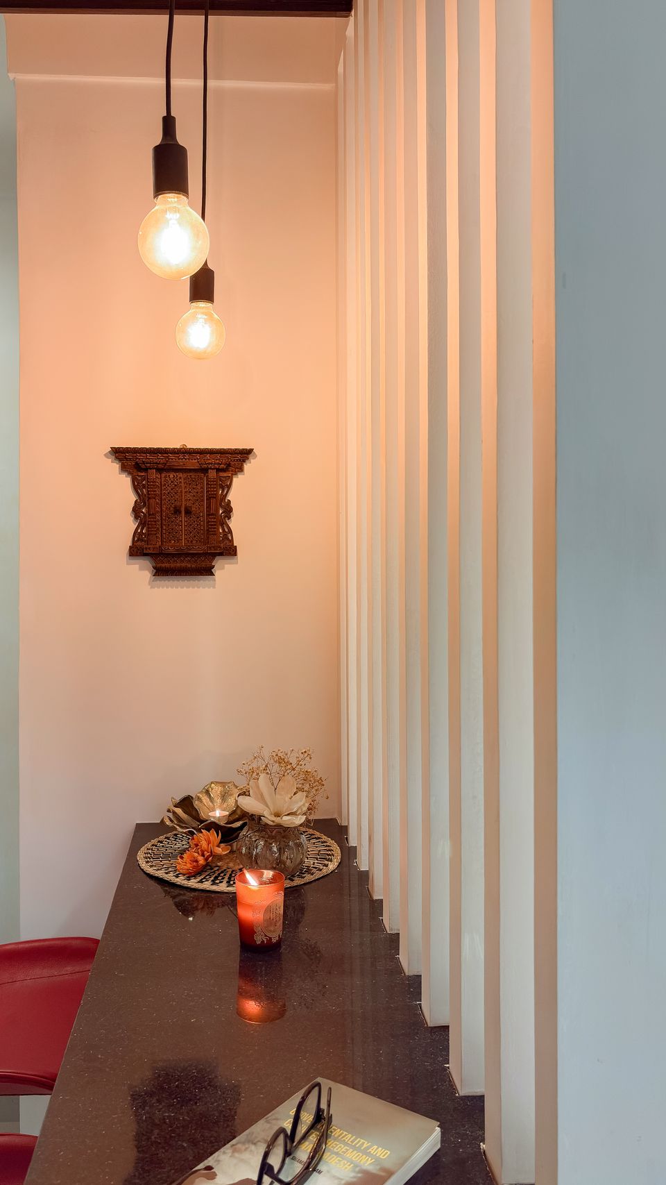 Preserved carved wall ornament beside the breakfast nook