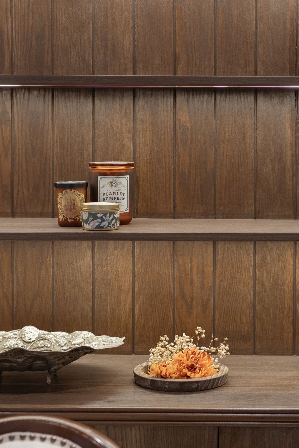 Close view of illuminated timber bedroom shelving