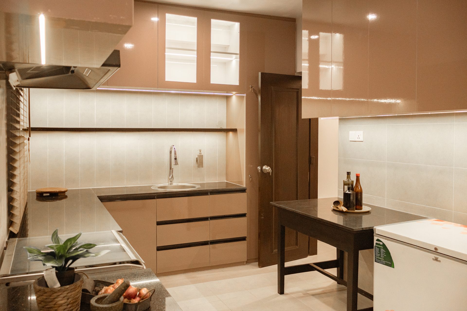 Vintage oven and range hood within the renovated kitchen