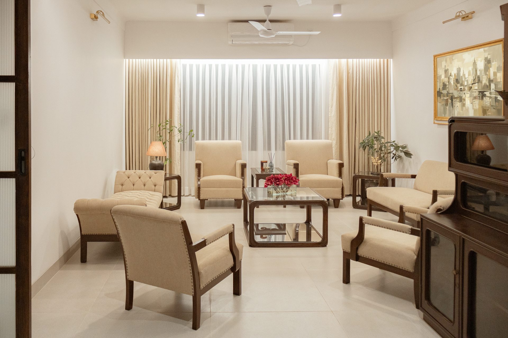 Circular arrangement of pale upholstered seating in the family living room